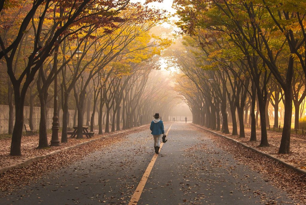 A lady walking to work practicing mindful commute